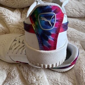 Puma women’s White and Tie-Dye Sneakers